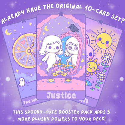 Spooky-cute tarot booster pack for the original DefaultKawaii 10-card set, featuring three illustrated cards: Justice (white stitched ghost with scales and a mirror reflection), The Wheel of Fortune (colorful wheel with hearts, moons, and skulls), and The Sun (smiling sun with skull flowers and a pink bunny), with text 'Already have the original 10-card set?' and 'This spooky-cute booster pack adds 5 more plushy powers to your deck!
